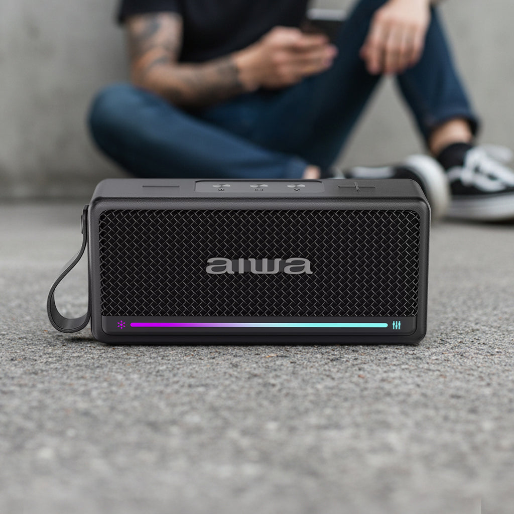 Bocina Bluetooth Aiwa 20W RMS IPX7 TWS con Radio FM y Luces LED